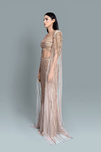 Gown with a dramatic cape and intricate embroidery in a beautiful pattern - Side